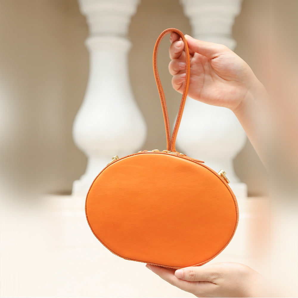 First Layer Cowhide Women's Crossbody Bag Simple Round Hand Carrying Retro