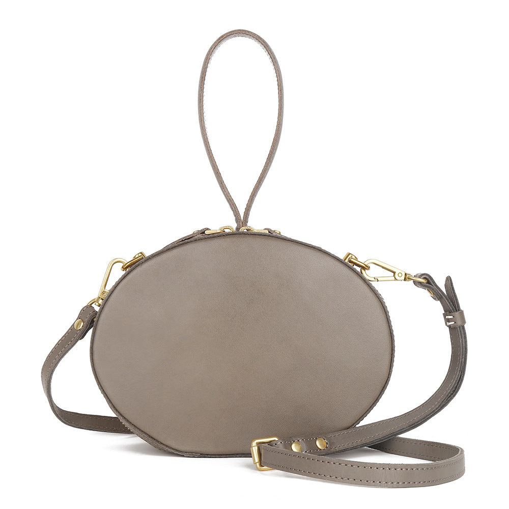 First Layer Cowhide Women's Crossbody Bag Simple Round Hand Carrying Retro