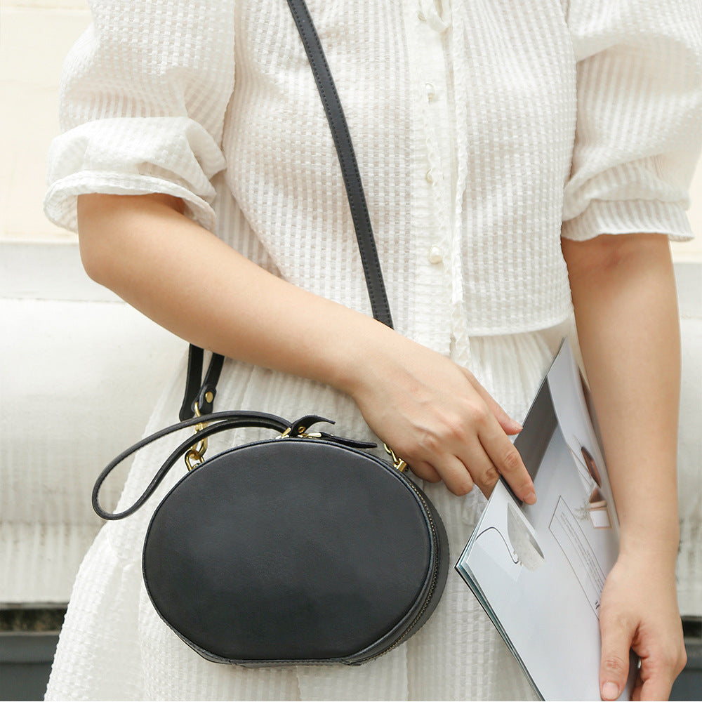 First Layer Cowhide Women's Crossbody Bag Simple Round Hand Carrying Retro